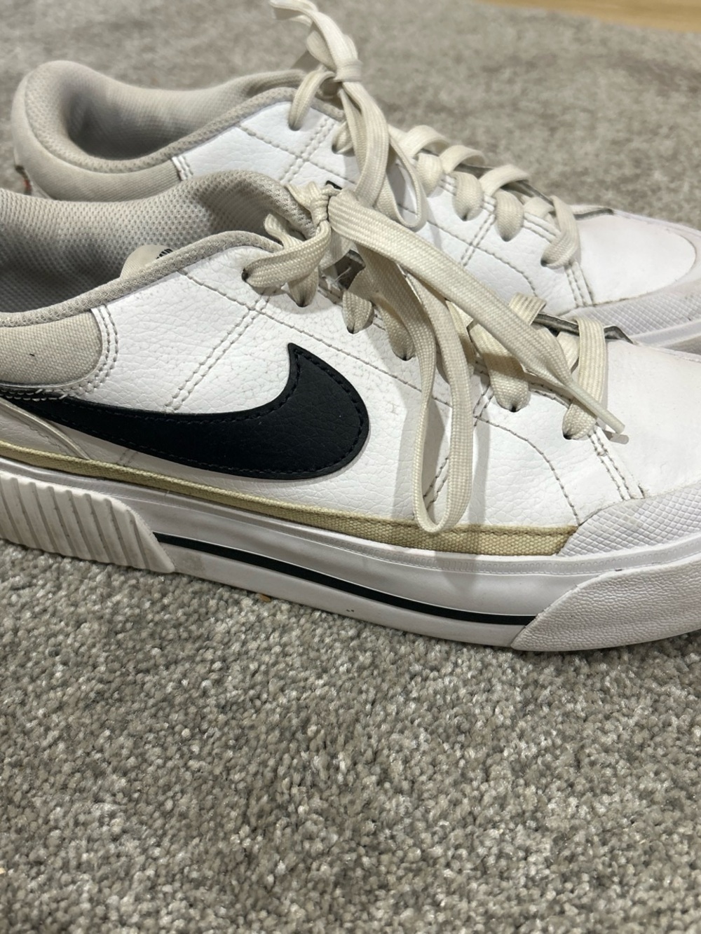 Nike White Leather Low-Top Sneakers with Black Swoosh and Cream Accents Size 7.5